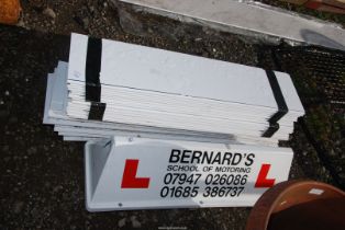 A School of Motoring Advertising sign and a quantity of plastic fascia board