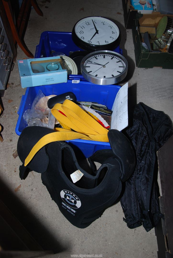 Two boxes of miscellaneous, clock, Stainless steel teapots,and Body protector, etc.