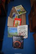 A box containing gardening books etc.