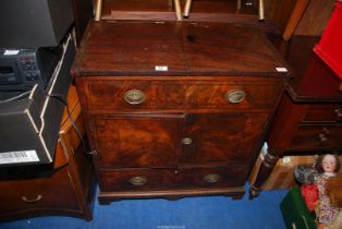 A Walnut and other woods cabinet with lift up lid, 30" wide x 17" deep x 32" high.