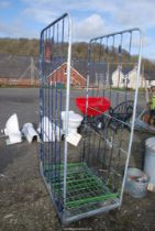 A galvanised stacker trolley.