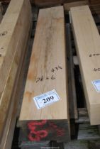 A length of Oak timber 43" long x 7 1/2" x 6".