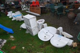 A large quantity of bathroom toilet and wash hand basin equipment.