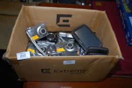 A box of cameras, Tom Tom, Samsung and Kodak cameras.
