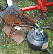 A cast iron range kettle, and fire range components.