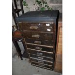 A wooden filing Cabinet, 45'' high x 20 1/2'' wide x 15'' deep.