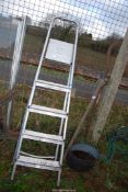 A five rung aluminium step ladder.
