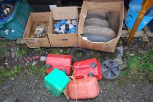 Four plastic fuel cans, wheelbarrow tyres 3.