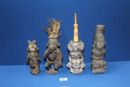 Two Tribal terracotta figures, a pottery pipe with bone stem and a carved stone bound figure.