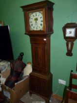 An Oak and Mahogany cased Longcase / grandfather clock having light and dark-wood stringing,