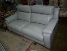 A nice quality two seater Sofa set upholstered in mid grey hide and each end having five button