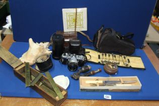 A quantity of miscellaneous including Olympus OM-1 camera, large conch shell,