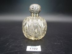 A Birmingham silver topped cut glass perfume bottle - glass interior stopper missing.