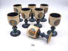 Eight Laugharne Pottery wine Goblets.