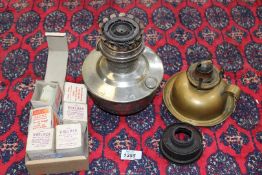 A Bed chamber oil lamp plus a chromium plated Aladdin lamp and five boxed "Gas light mantles -"The