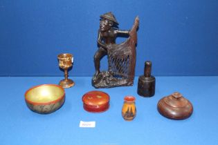 A small quantity of treen including; Oriental carving of a fisherman, goblet, lidded pot, etc.