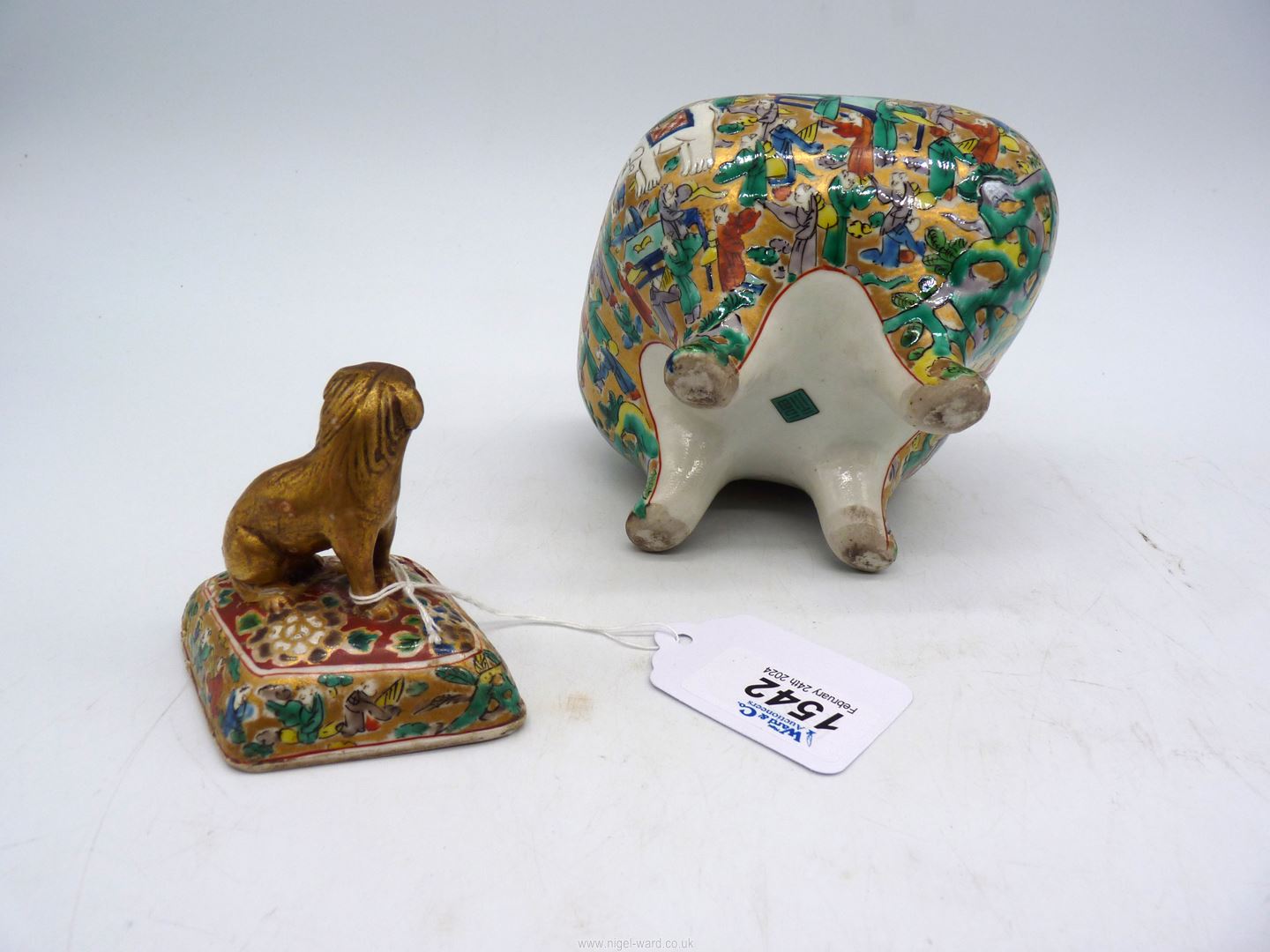 An Oriental diamond shaped footed and lidded pot with scenes of Elephants and sages with papers at - Image 3 of 3