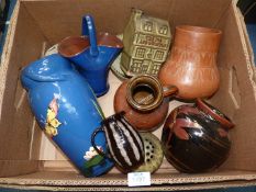 A quantity of Studio pottery including a Terrier, "The Pig and Whistle" pub money box,