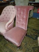 A circa 1900 Prie Dieu Chair upholstered in dusky pink velvet type fabric and standing on turned