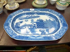 An early 19th C Swansea meat plate in blue and white in Chinoiserie pattern butterfly stylistic