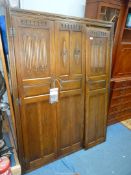 An Old Charm/Priory Oak type Wardrobe, 52 1/2'' x 24 1/2'' deep x 73'' high approx.