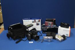 A box of digital cameras to include; FujiFilm, Finepix 5 14 mega pixel plus carry case,