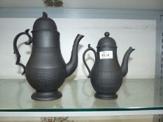Two black basalt coffee pots, one having a 'Britannia' finial (missing head),