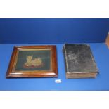 A leather bound 'Holy Bible - Old and New Testaments' printed by George E.