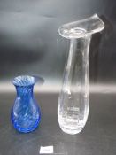 A vertical ribbed heavy clear Dartington Glass vase with floral shaped rim and thick signed base,