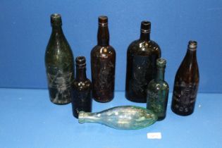 Seven bottles to include; Mackie & Gladstone green bottle,