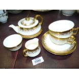 A George Jones crescent tea for two with rich gilding comprising eight pieces including tea pot.