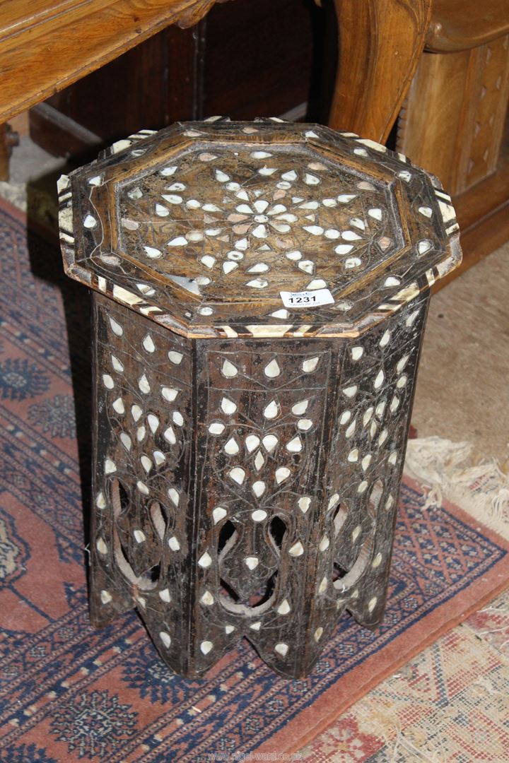 A small octagonal table inlaid with mother of pearl, some damage, 12 1/4" wide x 16 1/4" high. - Image 2 of 2