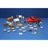 A quantity of plastic Britain's farm animals and cars including Corgi, etc.