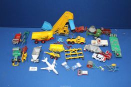 A box of assorted well used Dinky toys including a loader, cement mixer etc.