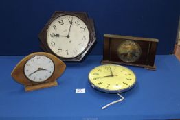 Four clocks including; Smith electric wall clock in Bakelite frame, Metamec mantle clock, etc.