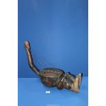 A Tribal Mangbetu four setting anthropomorphic harp with finely carved head,