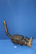 A Tribal Mangbetu four setting anthropomorphic harp with finely carved head,
