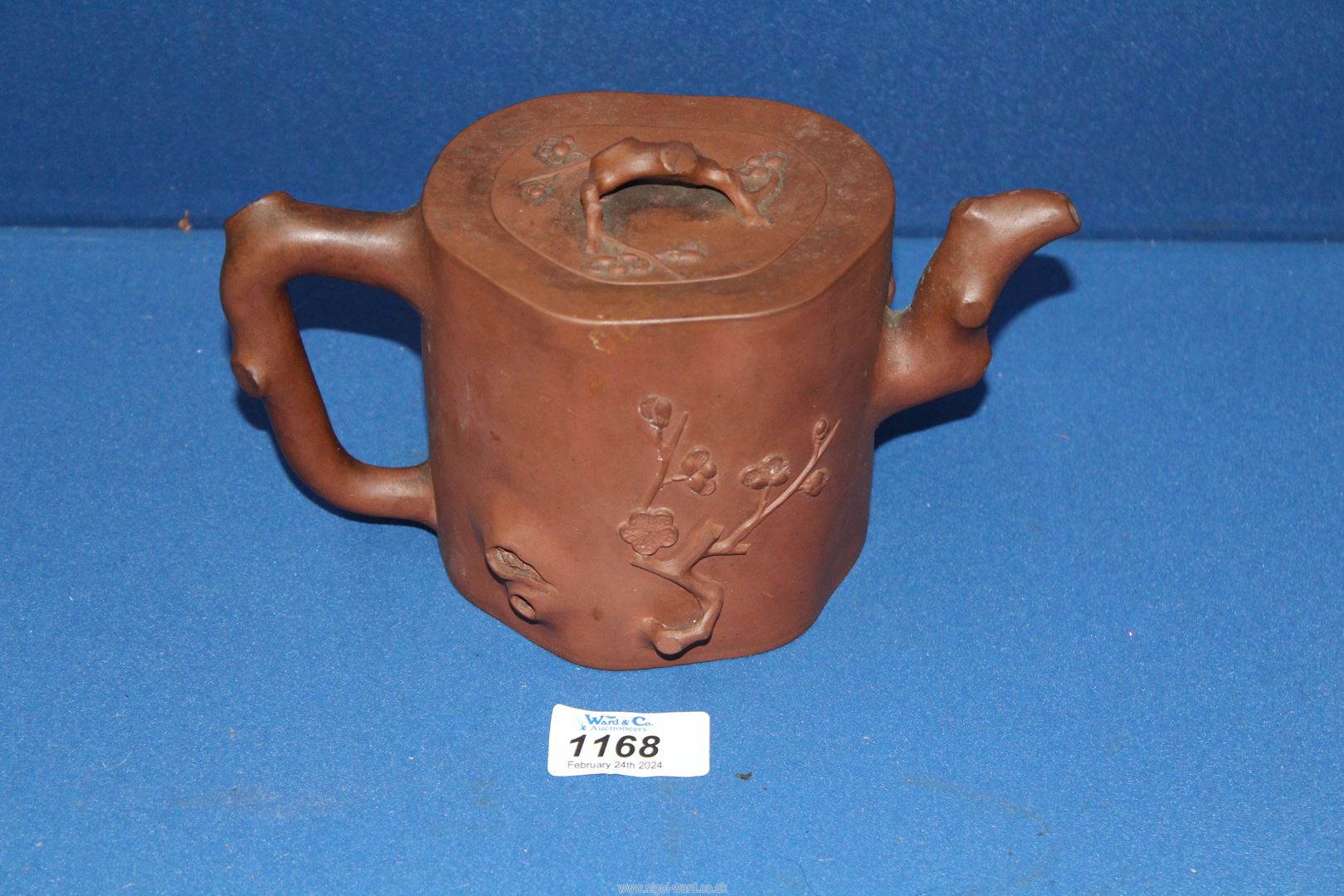 A Chinese terracotta Teapot having blossom relief, 5 1/2'' tall, lid chipped. - Image 2 of 6
