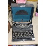 A cased Imperial typewriter.