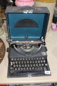 A cased Imperial typewriter.
