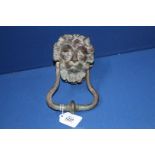 A Victorian, heavy metal Lion Mask door knocker, 5 1/4'' wide maximum (handle).