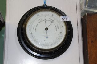 A Chadburn & Son Liverpool Barometer, in an ebonised frame, 10'' diameter.
