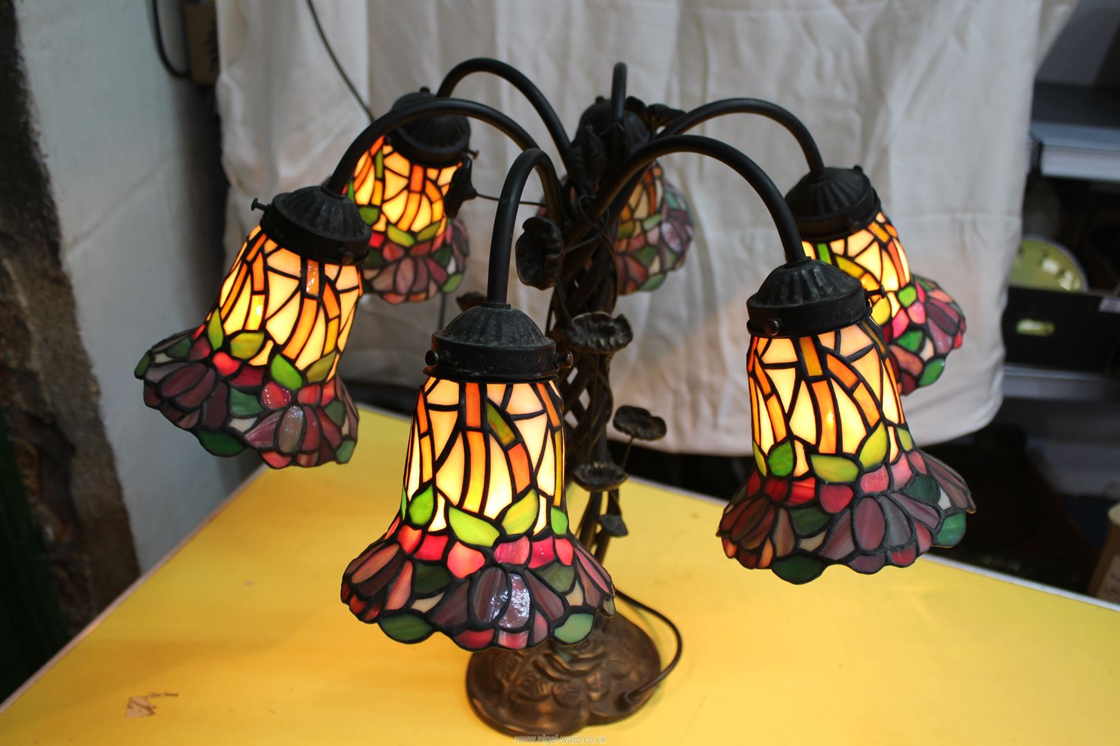 A six branch floral Tiffany style Lamp with entwined leaf base, 18 3/4'' tall. - Image 3 of 4