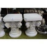 A pair of 'Past Times' jardiniere stands in the form of column capitals having scroll and floral