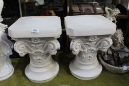 A pair of 'Past Times' jardiniere stands in the form of column capitals having scroll and floral