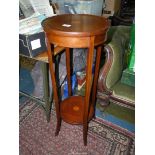 A boxwood strung Mahogany Jardiniere Stand, the legs united by a lower shelf,