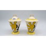 A pair of Elements of Fire lidded Pots with Day and Night pattern, 6 1/2" tall.