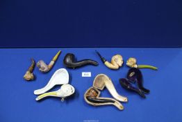 Six meerschaum pipes, some cased and two spare cases.