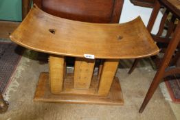 A circa 1940's African wooden Ashanti stool, 21" wide x 16" high.