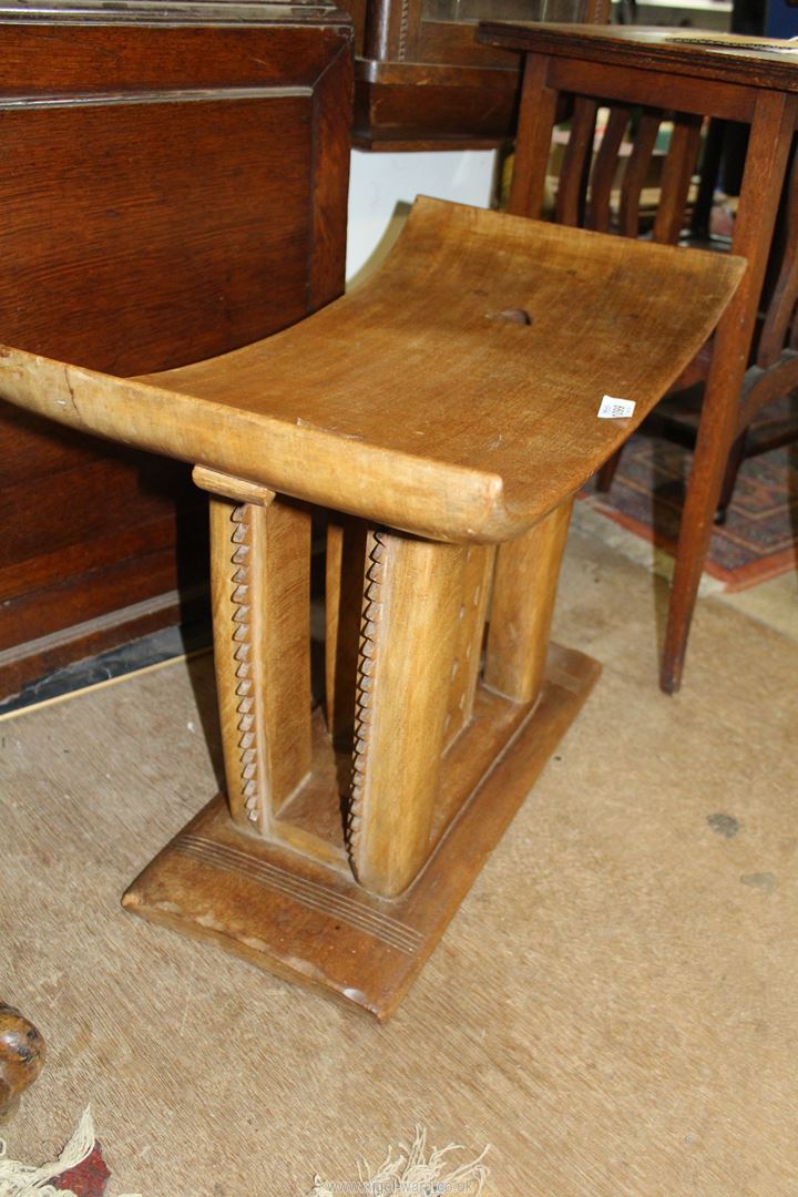 A circa 1940's African wooden Ashanti stool, 21" wide x 16" high. - Image 2 of 2